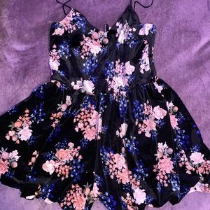 Floral short dress. Bottom is shorts made but still like skirt. (One-piece)